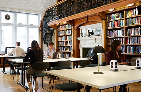 photo: Institution of Mechanical Engineers library interior, students working at laptops