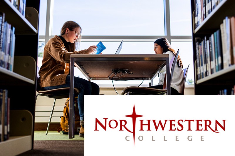 photo and logo: students working at a table in DeWitt Library, Northwestern College logo orverlay